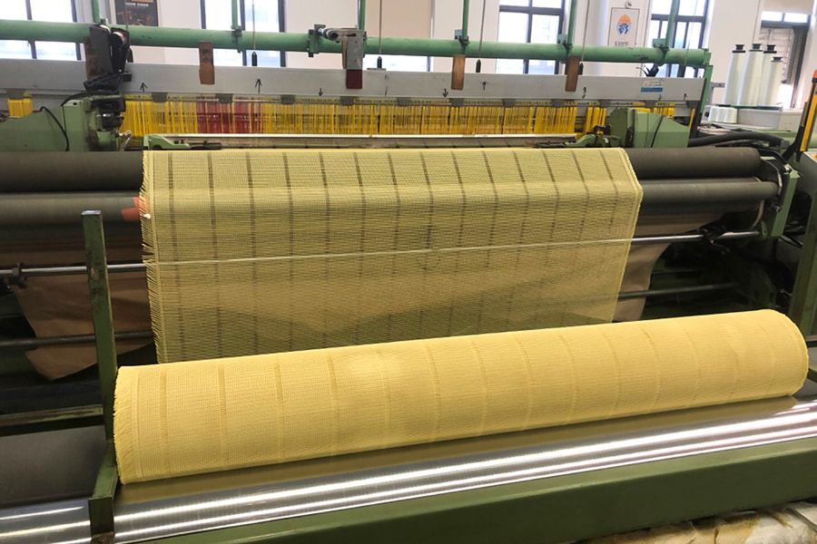 Rolo de tecido de malha reforçado com aramida de alta resistência – para materiais básicos compostos