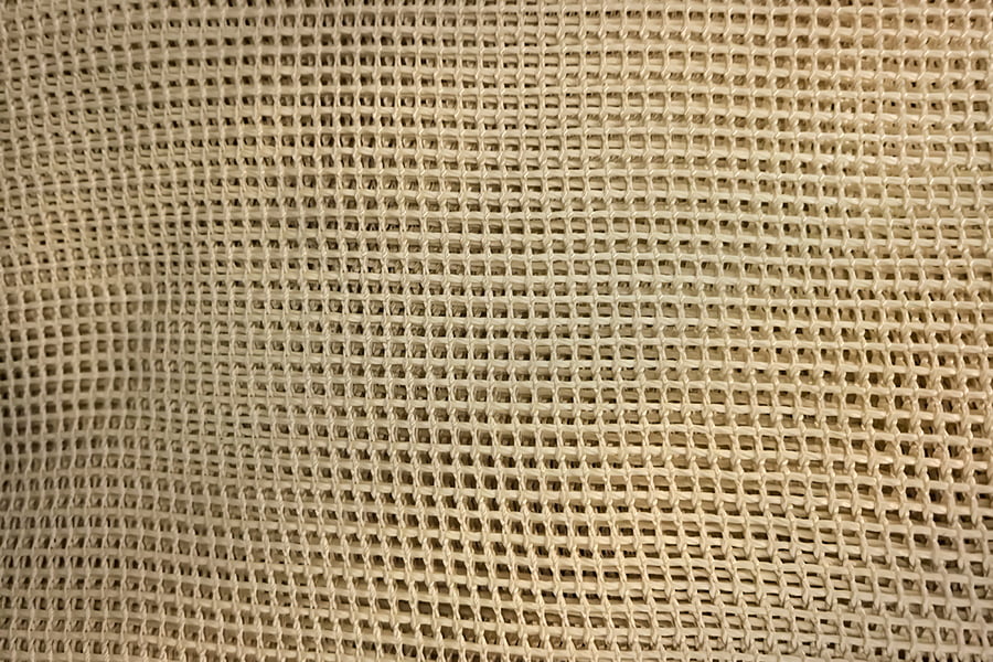 Rolo de tecido de malha reforçado com aramida de alta resistência – para materiais básicos compostos Rolo de tecido de malha reforçado com aramida de alta resistência – para materiais básicos compostos